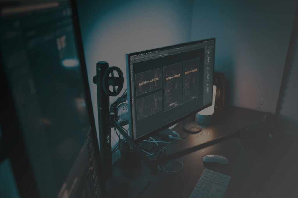 Completed UI/UX design layouts and digital interface screens displayed on a computer setup.